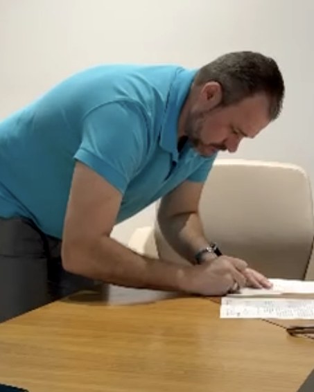 Grigoriy Kats signing project documentation